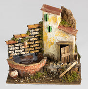 FONTANA CON POMPA 20X14X18CM UN GETTO PER PRESEPE