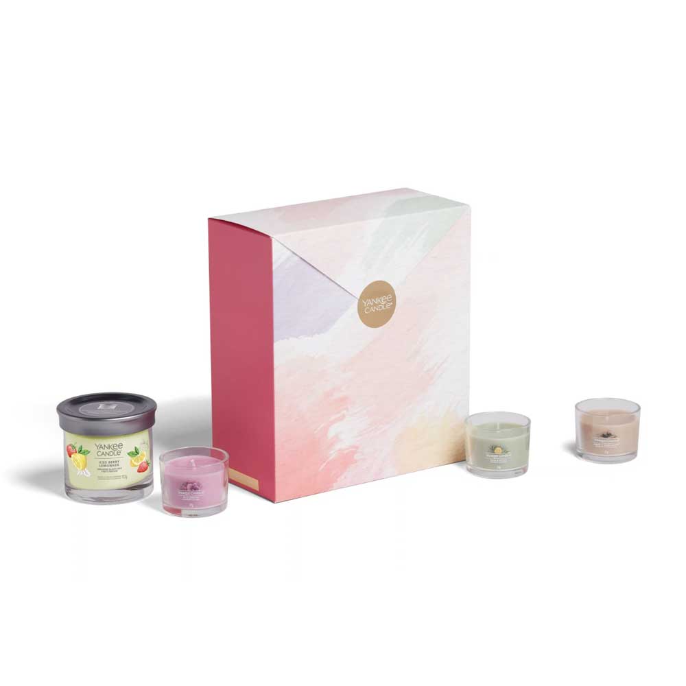 CONFEZIONE REGALO CON 1 CANDELA PICCOLA E 3 CANDELE VOTIVE IN VETRO