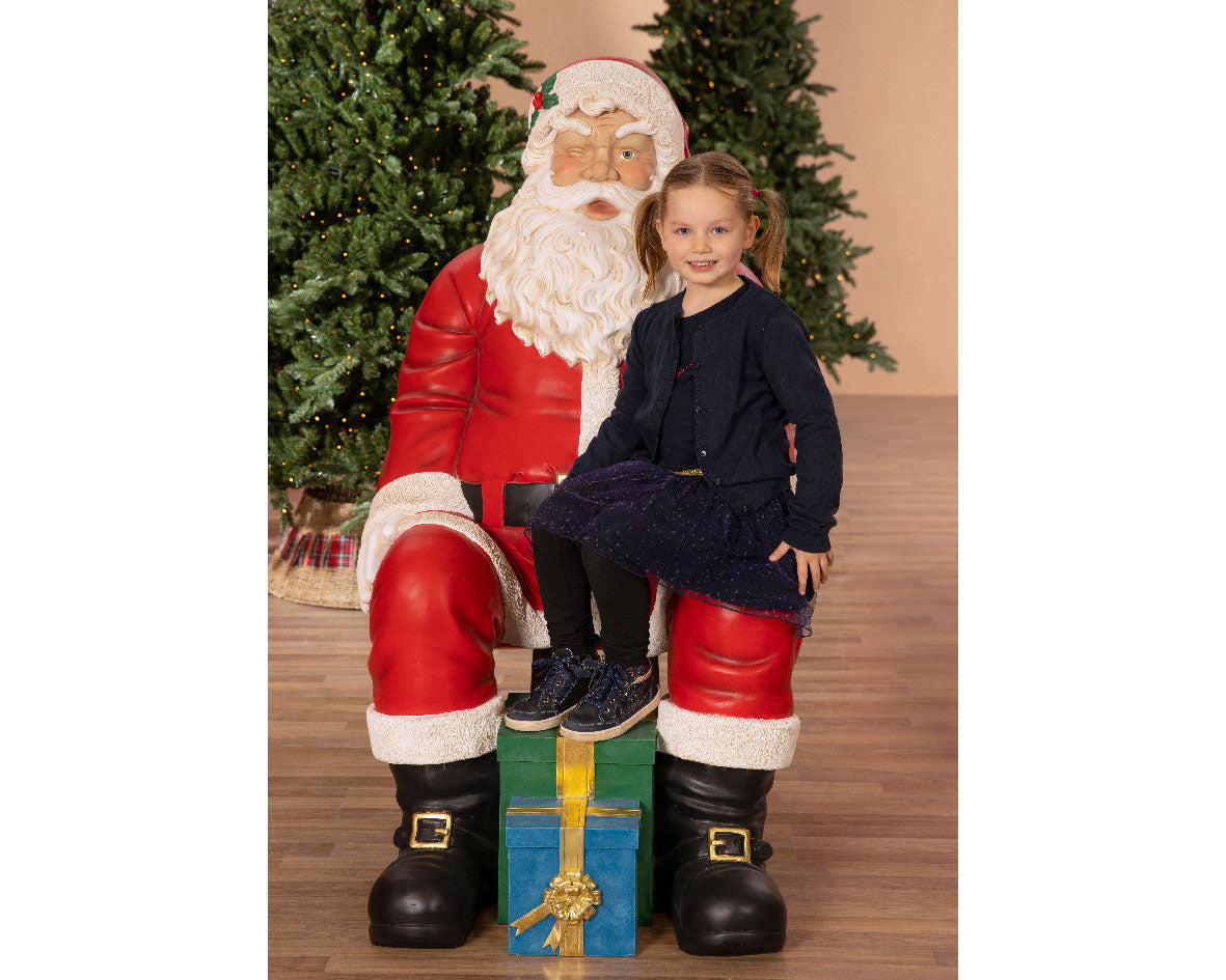 BABBO NATALE SEDUTO CHE FA L'OCCHIOLINO H137CM